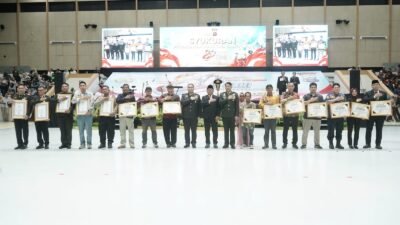 Upacara peringatan Hari Bhayangkara ke-80 yang berlangsung di halaman parkir Gedung Olahraga (GOR) Segiri Samarinda, Rabu (1/7/2026).