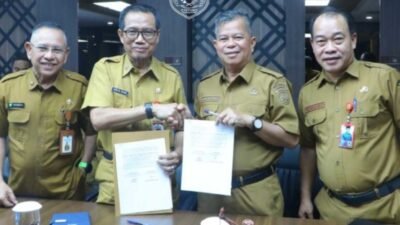 Penandatangan kesepakatan Pemkot Samarinda diwakili Asisten II Sekretariat, Marnabas Patiroy dan Pemprov Kaltim diwakili Andi Muhammad Ishak selaku Kepala Dinas Kesehatan Provinsi Kaltim